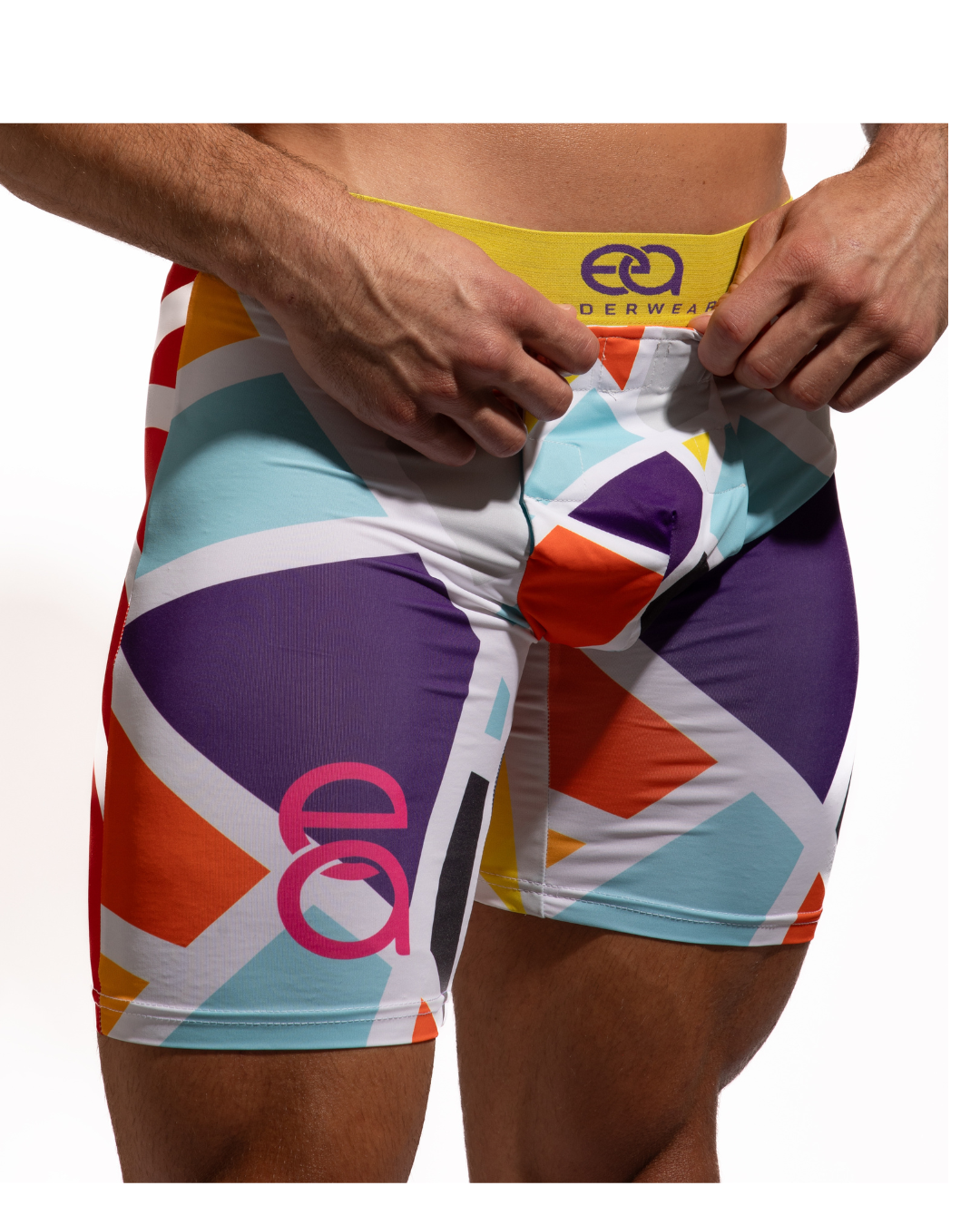 Colorful athletic shorts with geometric pattern and brand logo on a white background, Front View