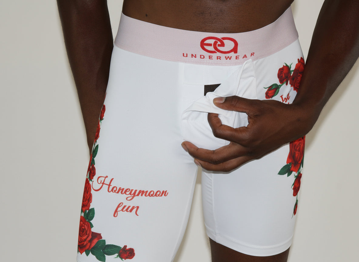 A model wearing white boxer briefs with a floral pattern, Front View