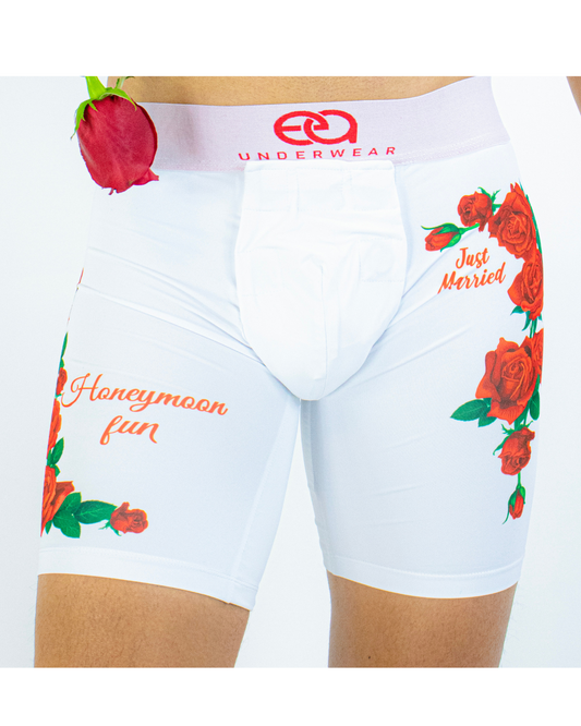 White underwear with floral designs and text on a white background, Front View